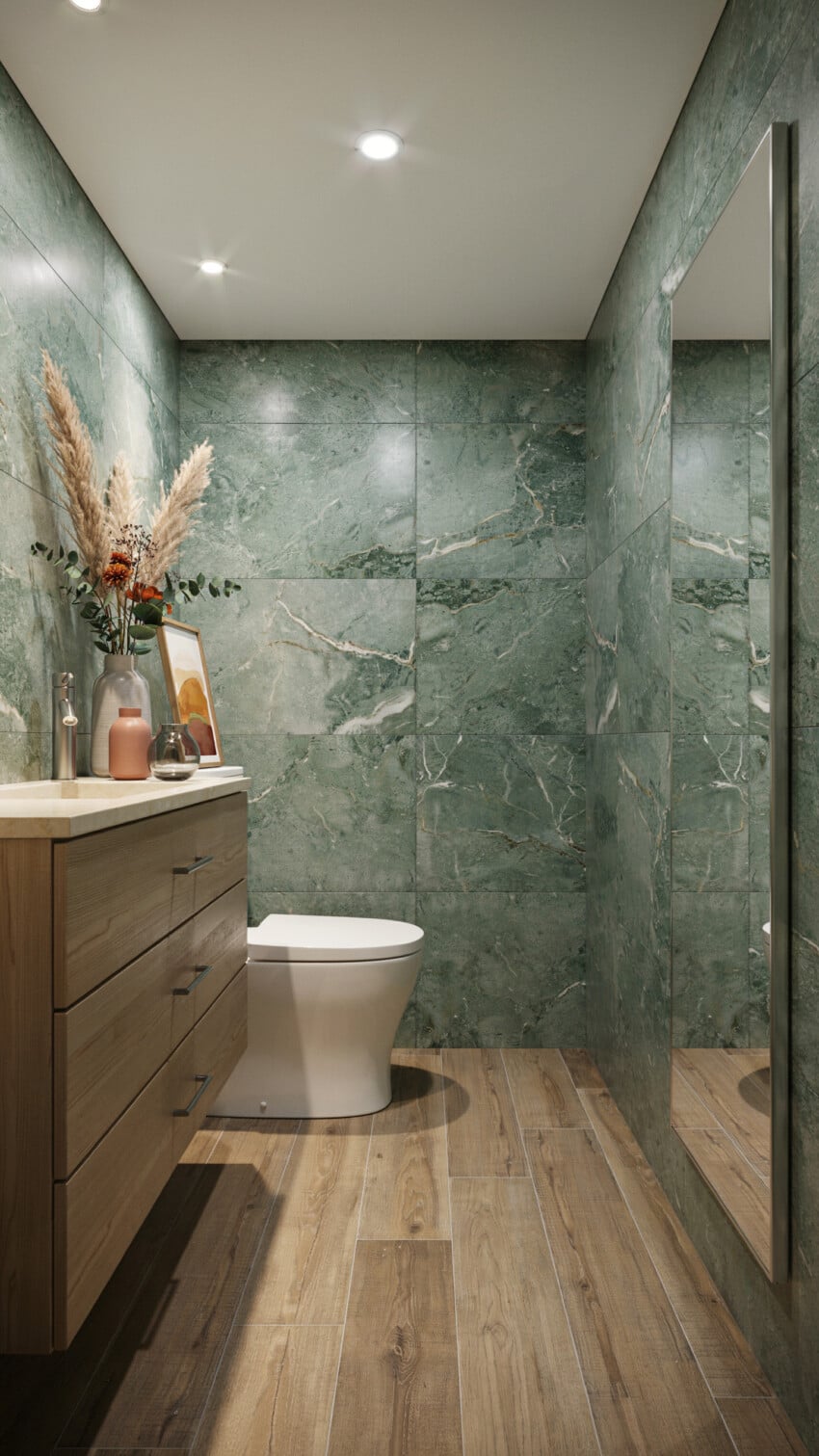 Neo Deco Powder Room with floor to ceiling green marble