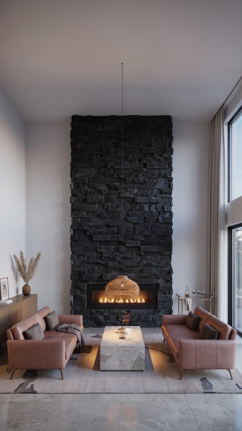 Floor-to-Ceiling Black Slate Accent Wall with Blush Leather Sofas