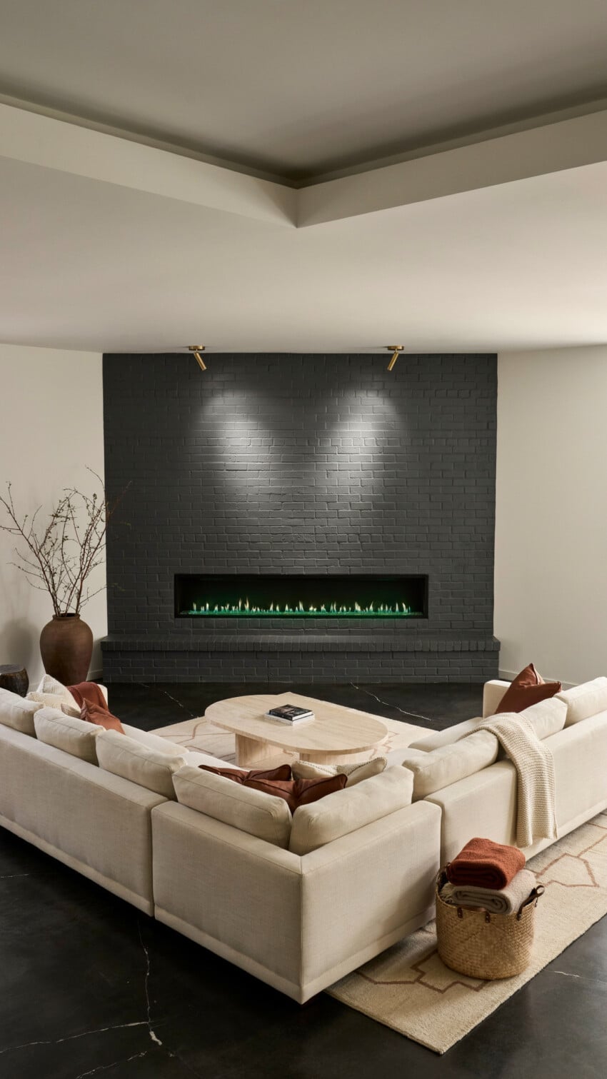 Corner Fireplace Design with Painted Charcoal Brick