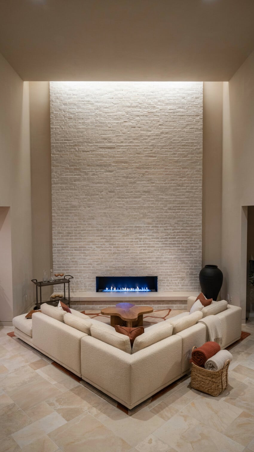 Corner Fireplace Design with Whitewashed Brick Wall