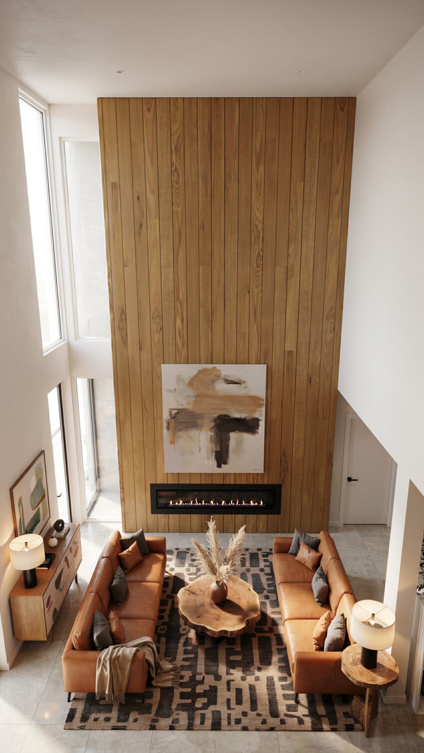 Tall Pine Shiplap Accent Wall with Cognac Leather Sectionals and Live-Edge Coffee Table